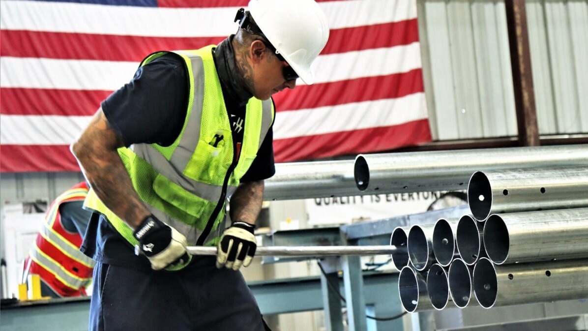 US clean energy jobs, Trump policies, renewable energy, job growth, Inflation Reduction Act, tariffs, E2 report, economic impact